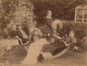 Children on rocking horse, c.1890